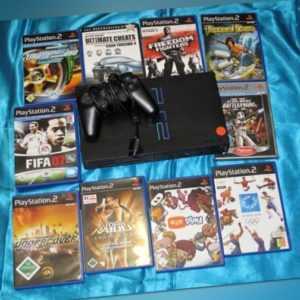 Sony PlayStation 2 Schwarz Spielekonsole + 4 Spiele